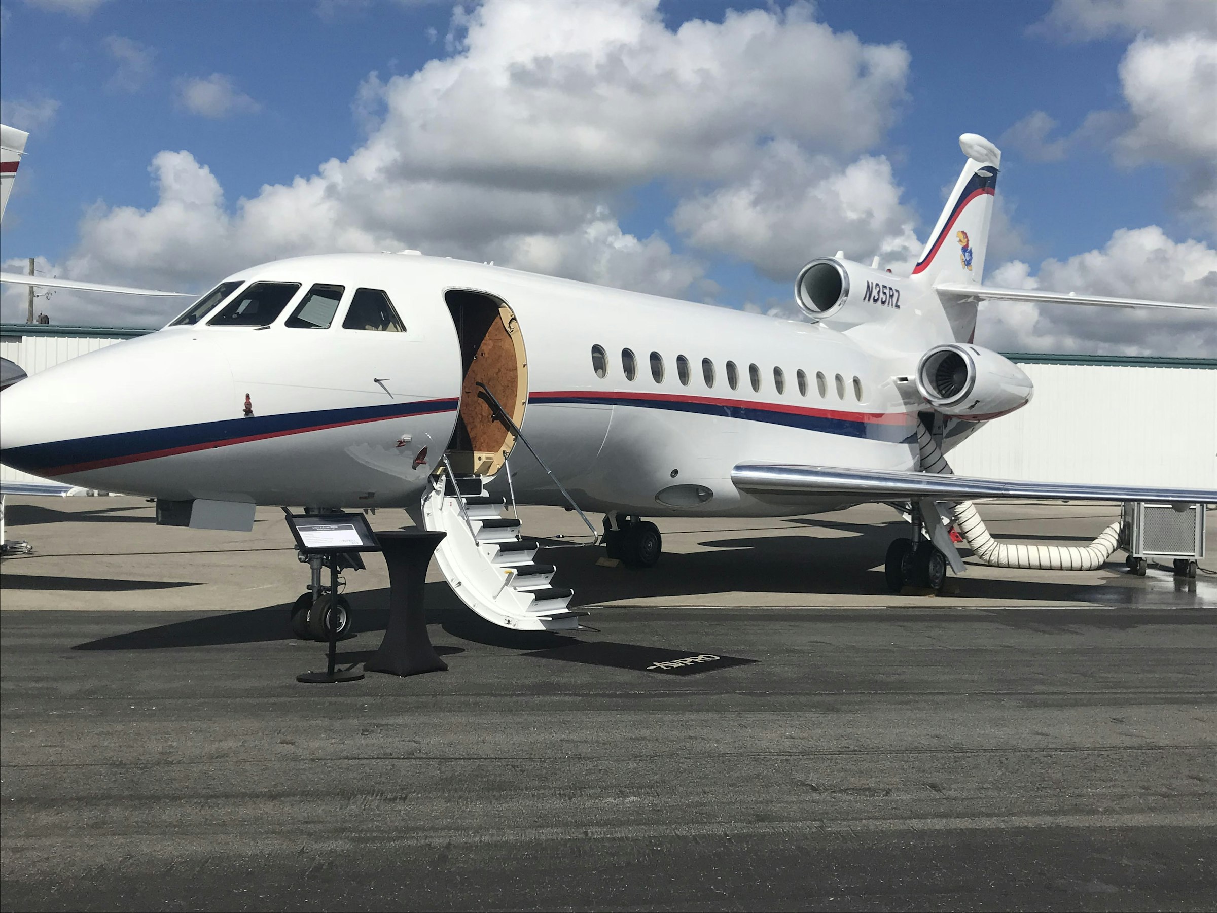 Private jet on the ramp with boarding stairs open